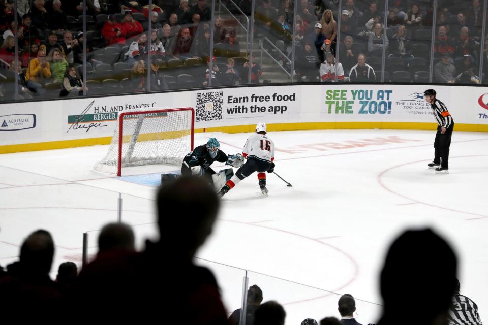 Coachella Valley Firebirds right wing Kole Lind scores the game winning shootout goal against the San Jose Barracuda at Acrisure Arena in Palm Desert, Calif., on Tuesday, Jan. 10, 2023. Firebirds won 3-2. 