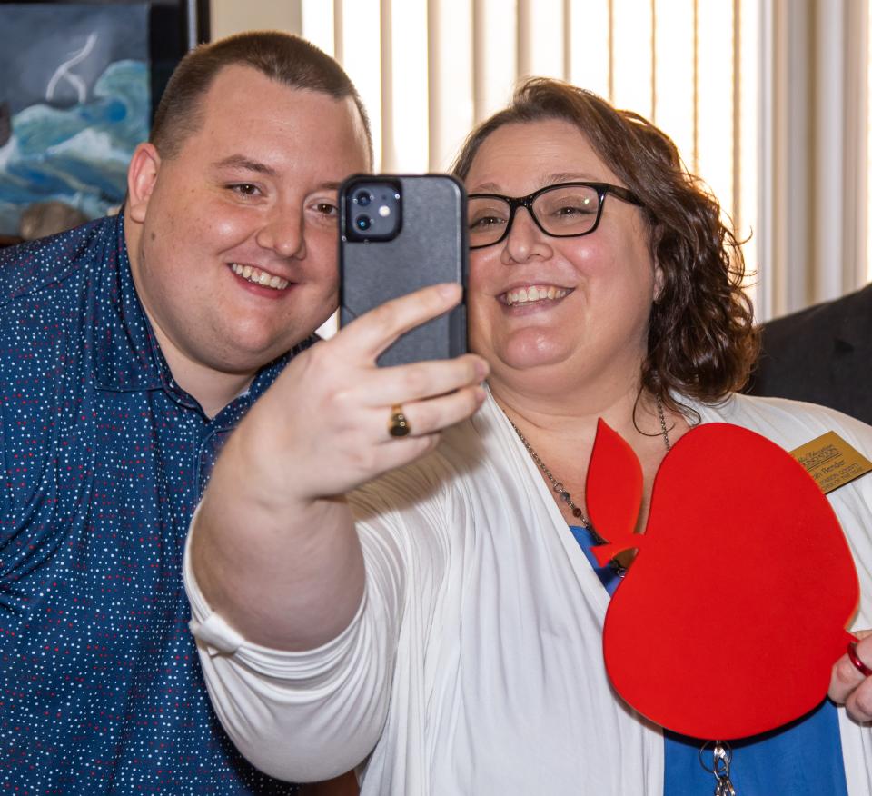 Lake Weir High School Pre IB English teacher John Gibb takes a selfie with last year's Teacher of the Year, Leah Bender.