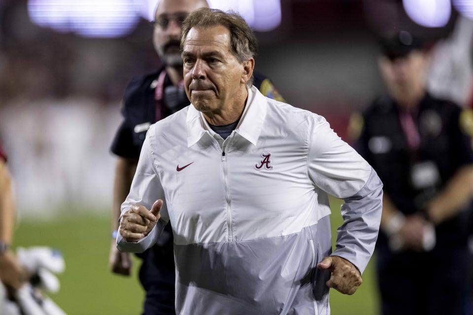 Alabama head coach Nick Saban jogs off the field after an NCAA college football game against Southern Mississippi, Saturday, Sept. 25, 2021, in Tuscaloosa, Ala. (AP Photo/Vasha Hunt)