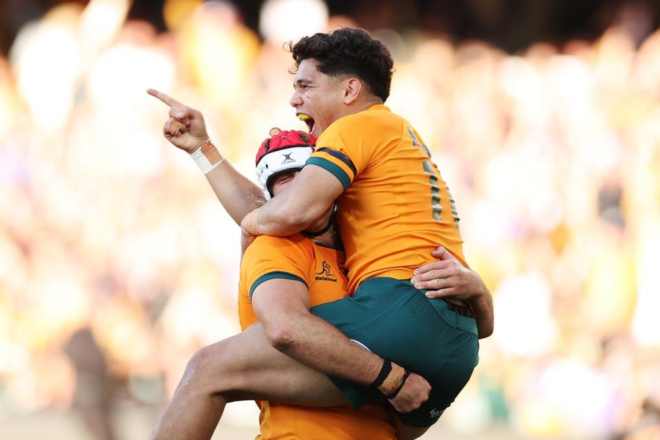 Noah Lolesio of the Wallabies celebrates with try-scorer Fraser McReight  (Getty Images)