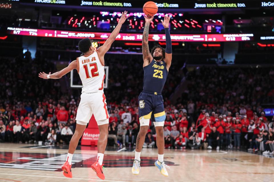Marquette forward David Joplin shoots past St. John's guard RJ Luis Jr. at Madison Square Garden on Jan. 20. Joplin is 43 for 104 (41.3%) overall this season from beyond the arc.