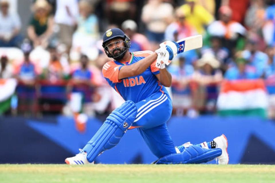 England will take on India in the semi-finals of the T20 Cricket World Cup after Rohit Sharma, captain of the tournament favourites, knocked 92 runs off 41 balls in a 24-run win over Australia.