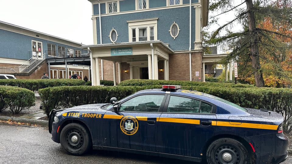 A New York State Police Department cruiser is parked in front of Cornell University's Center for Jewish Living On Monday. - David Bauder/AP