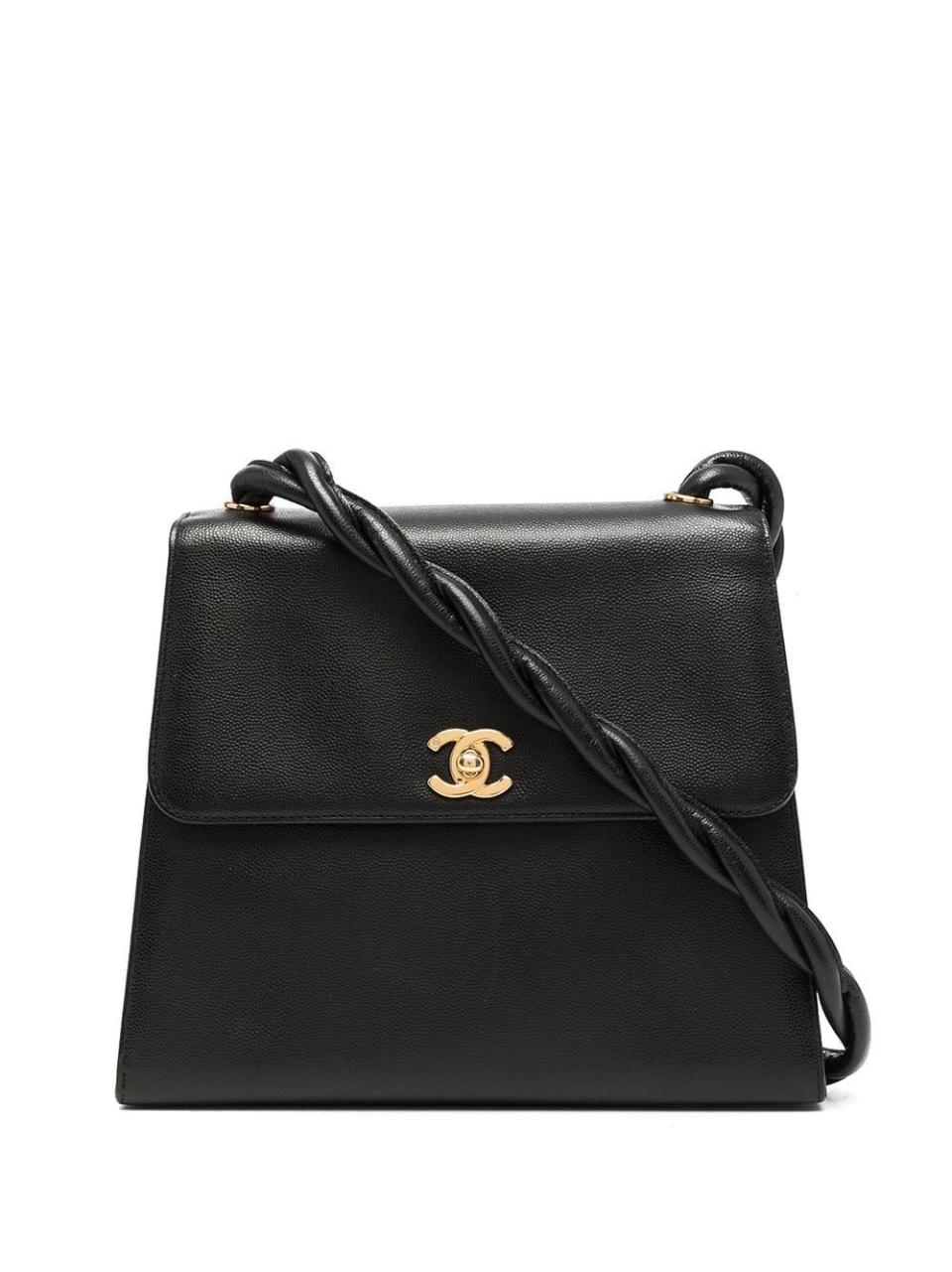 <p><strong>Chanel Pre-Owned</strong></p><p>farfetch.com</p><p><a href="https://go.redirectingat.com?id=74968X1596630&url=https%3A%2F%2Fwww.farfetch.com%2Fshopping%2Fwomen%2Fchanel-pre-owned-1998-cc-turn-lock-shoulder-bag-item-16951150.aspx&sref=https%3A%2F%2Fwww.townandcountrymag.com%2Fstyle%2Fg38380096%2Ffarfetch-cyber-monday-2021%2F" rel="nofollow noopener" target="_blank" data-ylk="slk:Shop Now;elm:context_link;itc:0;sec:content-canvas" class="link ">Shop Now</a></p><p><strong><del>$7,319</del> $6,953 (3% off)</strong></p>