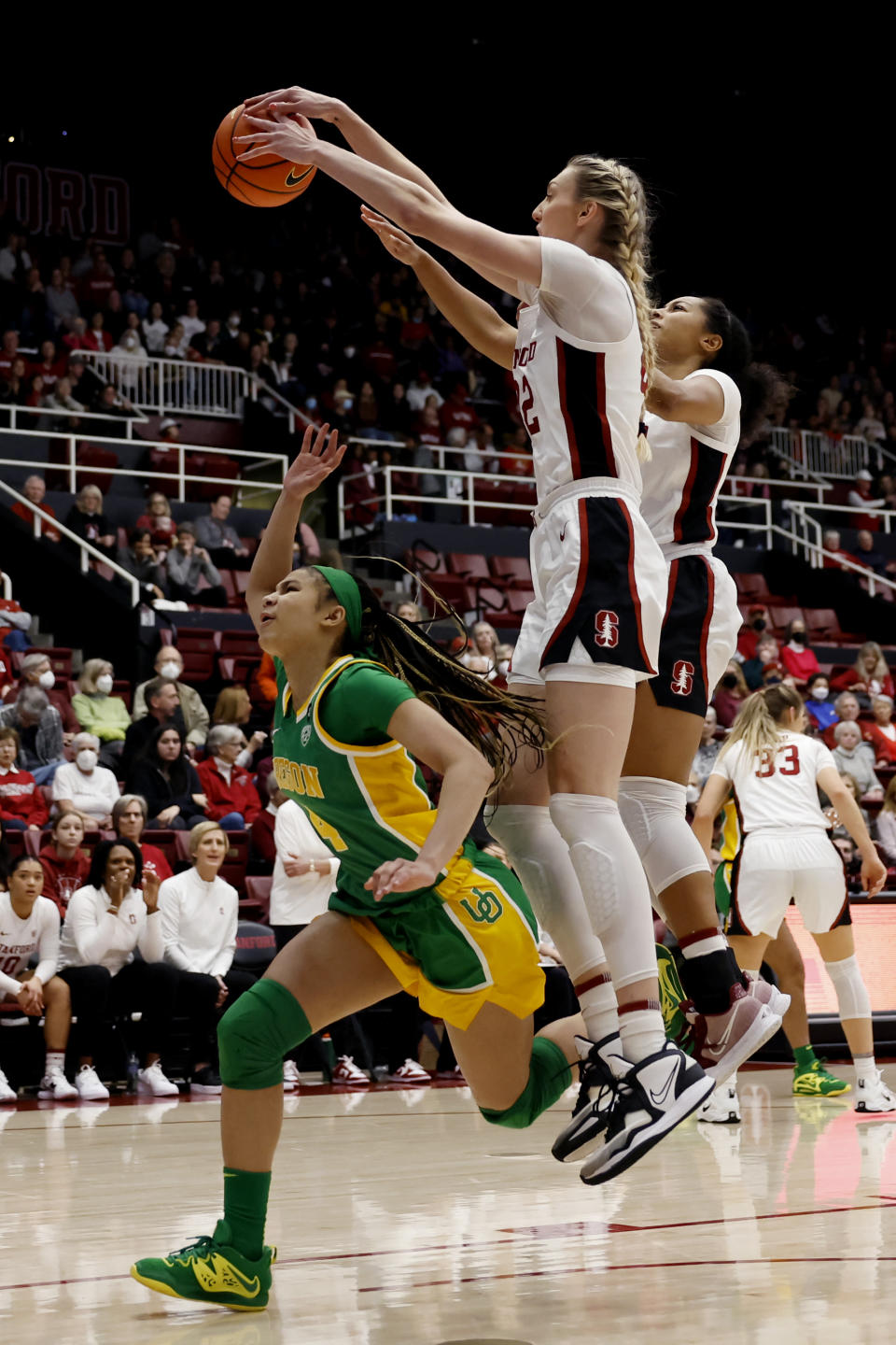 Stanford forward Cameron Brink, front right, blocks a shot by Oregon guard Endyia Rogers, left, during the first half of an NCAA college basketball game Sunday, Jan. 29, 2023, in Stanford, Calif. (AP Photo/Josie Lepe)