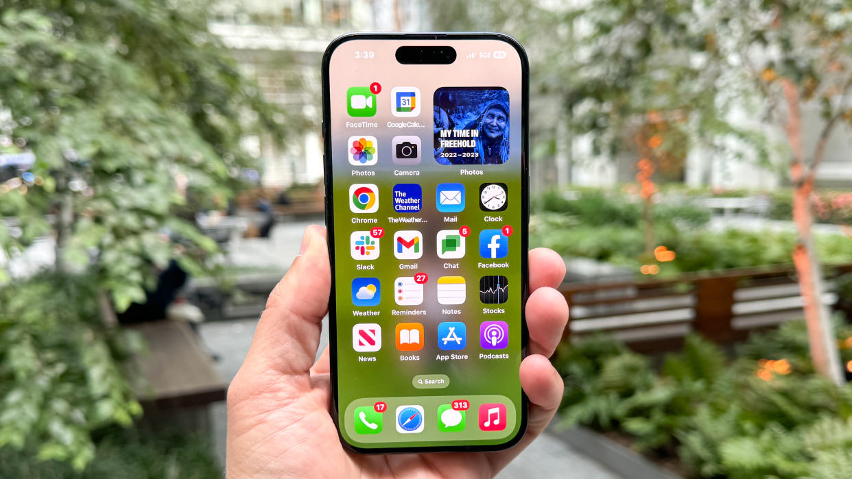  IPhone 15 Pro shown in hand. 