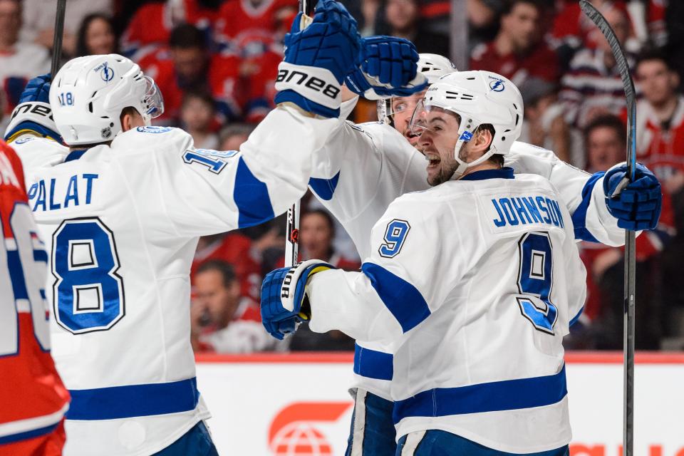 MONTREAL, QC - MAY 01: Tyler Johnson #9 of the Tampa Bay Lightning celebrates his goal with teammates in Game One of the Eastern Conference Semifinals against the Montreal Canadiens during the 2015 NHL Stanley Cup Playoffs at the Bell Centre on May 1, 2015 in Montreal, Quebec, Canada. (Photo by Minas Panagiotakis/Getty Images)