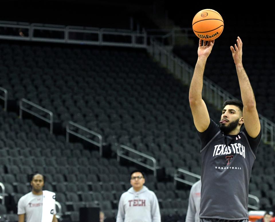 Texas Tech's forward Fardaws Aimaq (11) shoots the ball during practice ahead of the Big 12 basketball tournament, Tuesday, March 7, 2023, at T-Mobile Center in Kansas City. 