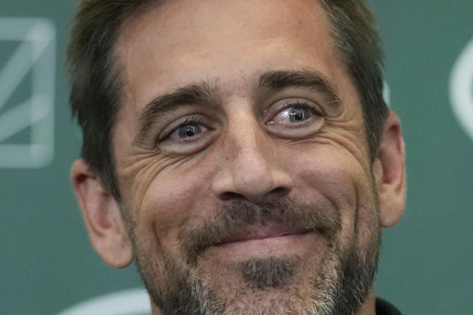New York Jets' quarterback Aaron Rodgers smiles during an NFL football press conference at the Jets' training facility in Florham Park, N.J., Wednesday, April 26, 2023. (AP Photo/Seth Wenig)