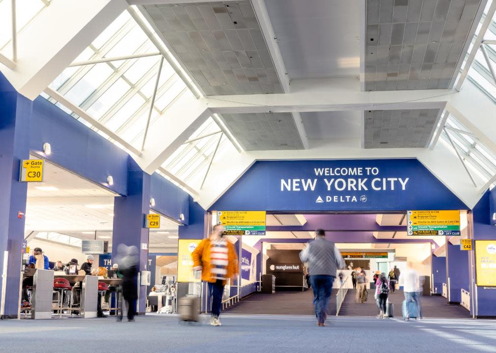 Welcome to New York City sign at a Delta gate in terminal C at Laguardia Airport.