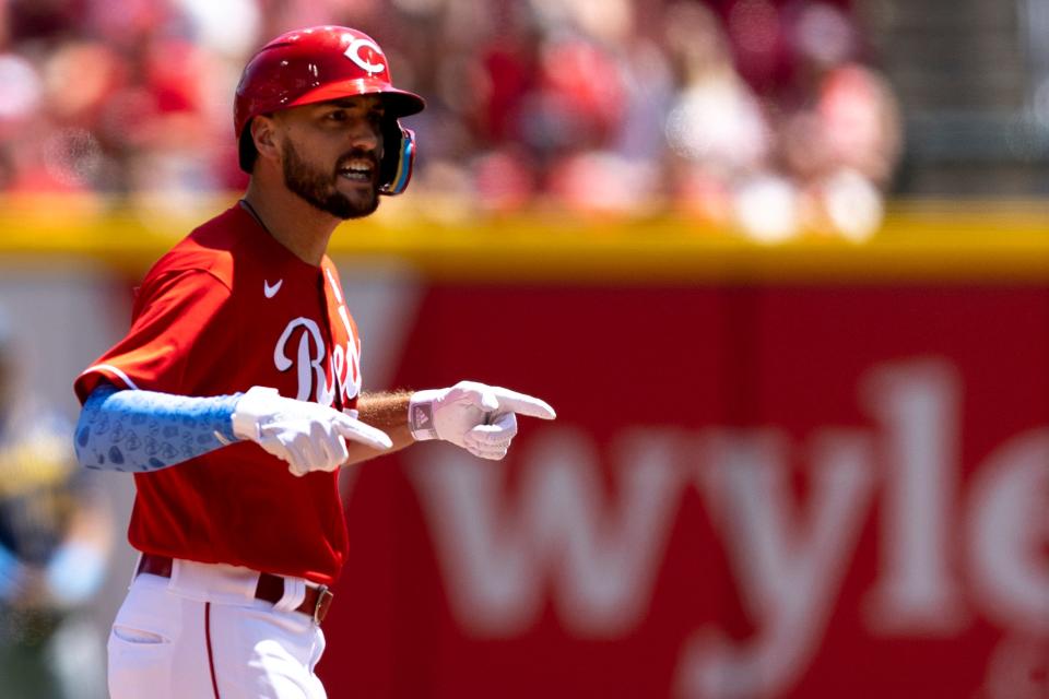 Cincinnati Reds right fielder Albert Almora Jr. (3) celebrates after hitting a 2-run RBI double to tie the game 3-3 in the fourth inning of the MLB game between the Cincinnati Reds and the Milwaukee Brewers in Cincinnati at Great American Ball Park on Sunday, June 19, 2022. 