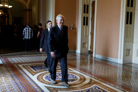 Senate Majority Leader Mitch McConnell departs after speaking with the media following the Republican policy luncheon on Capitol Hill in Washington, D.C., U.S., March 14, 2017. REUTERS/Aaron P. Bernstein