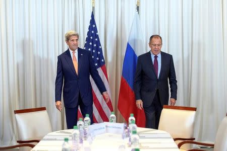 U.S. Secretary of State John Kerry (L) and Russian Foreign Minister Sergei Lavrov (R) before a bilateral meeting focused on the Syrian crisis in Geneva, Switzerland August 26, 2016. REUTERS/Martial Trezzini/Pool