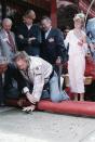 <p>In 1984, the actor received the honor of placing his handprints into the sidewalk at the Grauman's Chinese Theatre. His children, Kyle and Alison, look on. Later that year, Eastwood officially divorced their mother, after being separated for almost 20 years. </p>