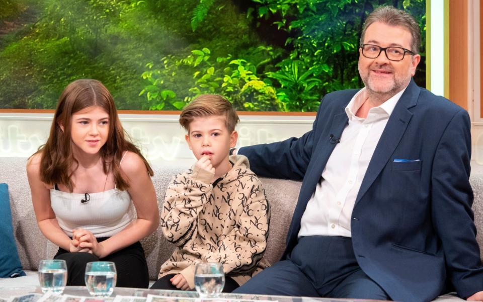 Draper with his children Darcey and William on Good Morning Britain in 2019