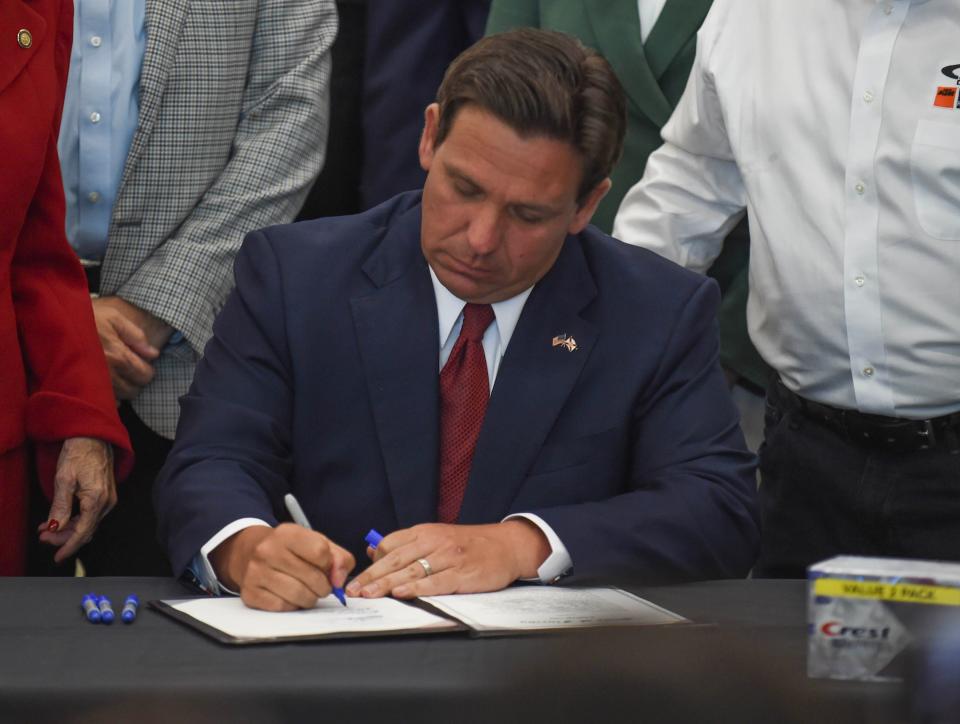 Florida Gov. Ron DeSantis, seen here signing a retail theft bill into law Tuesday, April 9 in Stuart, signed two drug bills Monday and expanded the state's addiction recovery program.