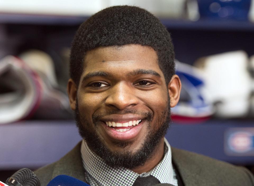 Montreal Canadiens defenseman P.K. Subban speaks to reporters at NHL hockey practice Tuesday, Jan. 7, 2014, in Brossard, Quebec. Subban was named to Canada's Olympic hockey team on Tuesday. (AP Photo/The Canadian Press, Ryan Remiorz)