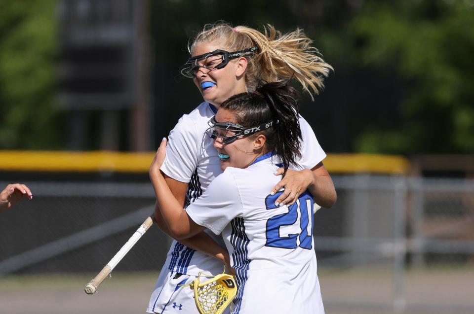 Bronxville's Kiki Tormey is congratulated on her goal.