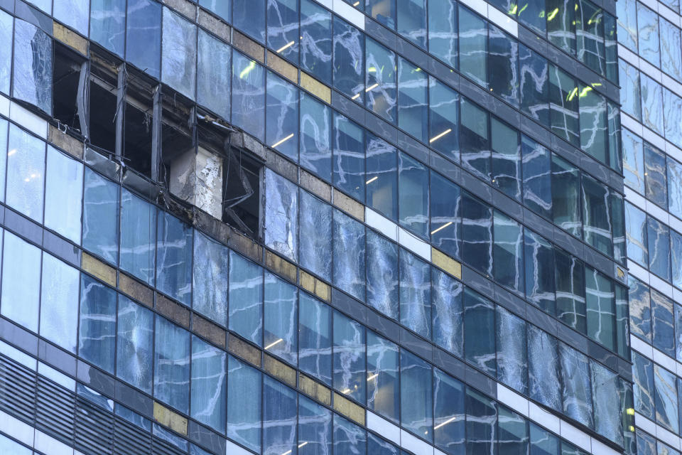 A view of the damaged building is seen in the "Moscow City" business district after a reported drone attack in Moscow, Russia, early Tuesday, Aug. 1, 2023. Ukrainian drones again targeted Moscow and its surroundings early Tuesday morning, the Russian military reported. Two of three launched were shot down outside Moscow, while one crashed into a skyscraper in the Moscow City business district, damaging the building’s facade. (AP Photo)
