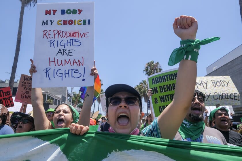 Venice, CA - July 04: Demonstrators take part in a July 4 National Day of Protest: "WHEN WOMEN ARE NOT FREE, NO ONE IS FREE!," Monday, July 4, 2022 in Venice, CA.(Ringo Chiu / For The Times)