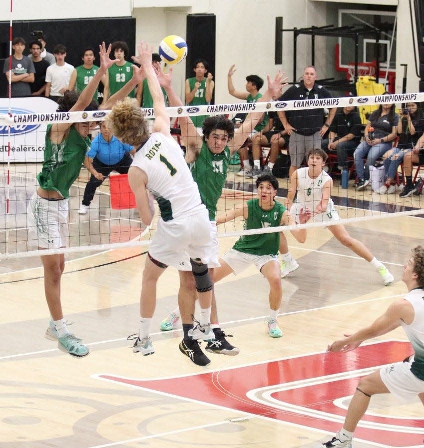 Royal's Evan Costley goes for the kill during the Highlanders' sweep of Upland in the CIF-SS Division 3 championship match on Saturday at Long Beach City College.