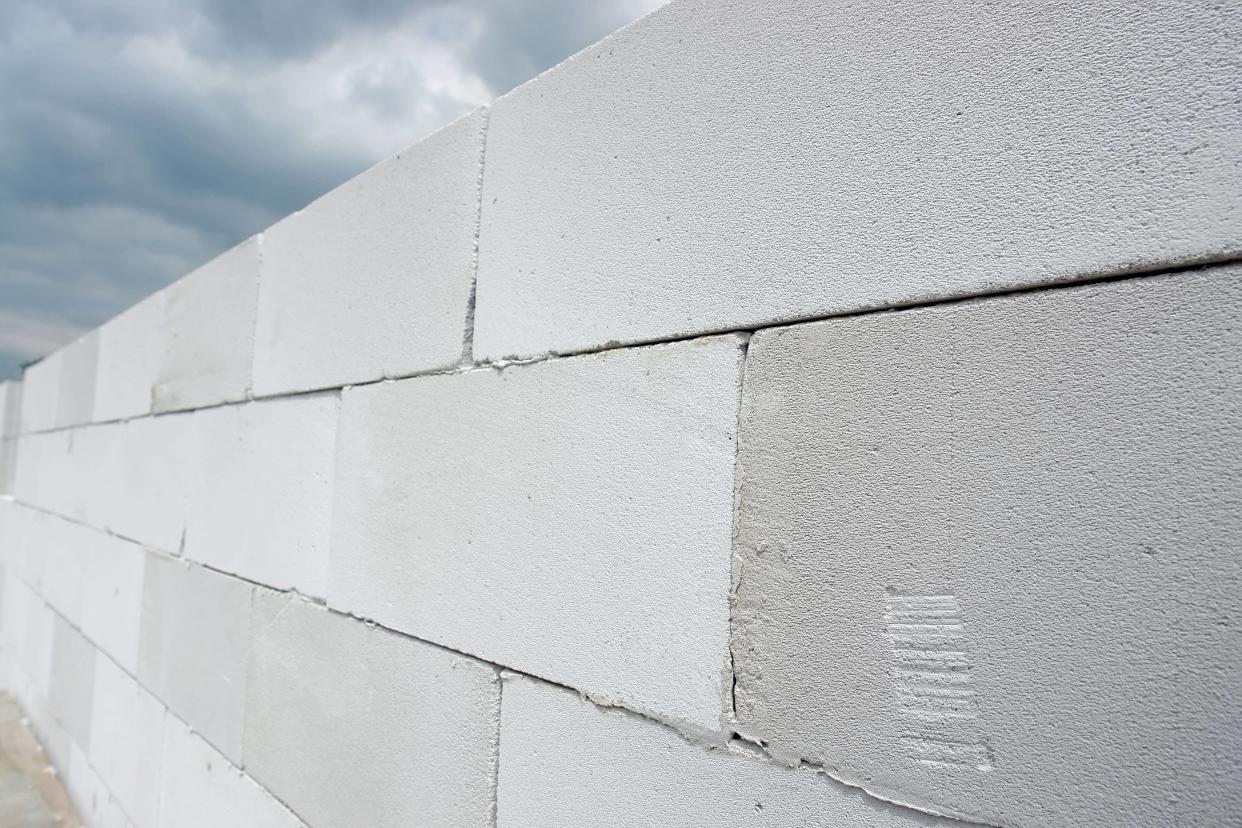 Wall made from white aerated autoclaved concrete blocks (Alamy/PA)