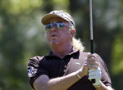 Miguel A. Jimenez hits from they tee on the second hole during the final round of play in the Greater Gwinnett Championship golf tournament of the Champions Tour, Sunday, April 20, 2014, in Duluth, Ga. (AP Photo/John Bazemore)