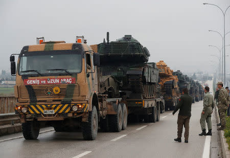 A Turkish military convoy arrives at an army base in the border town of Reyhanli near the Turkish-Syrian border in Hatay province, Turkey January 17, 2018. REUTERS/Osman Orsal