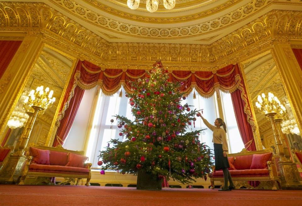 The Crimson Drawing Room at Windsor Castle decorated for Christmas in 2021.