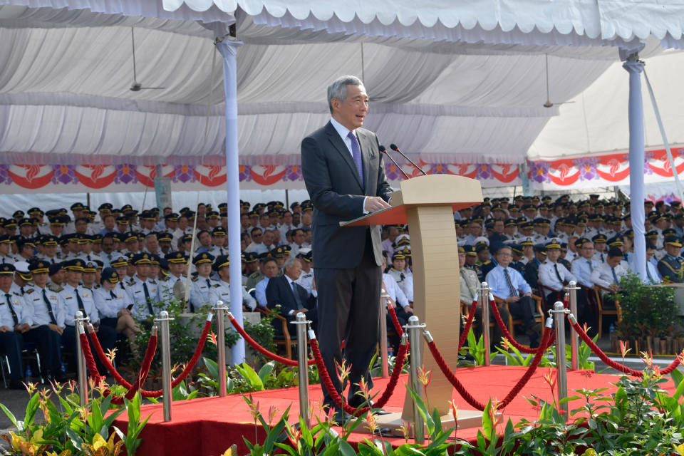 <p>PM Lee delivering the keynote address at the RSAF 50th anniversary parade at Tengah Air Base on Saturday (1 September.<br>(PHOTO: Mindef) </p>