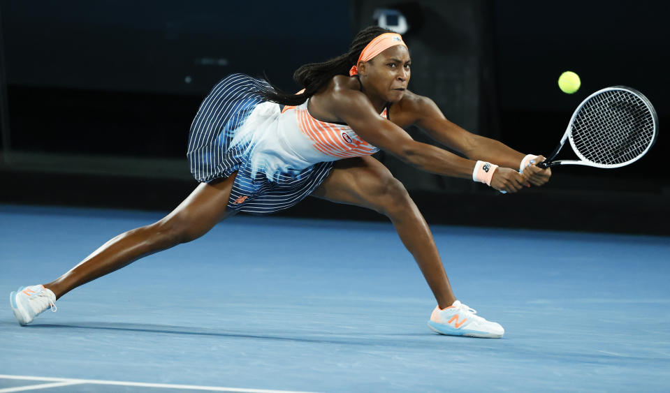 United States' Coco Gauff makes a backhand return to Ukraine's Elina Svitolina during their second round match at the Australian Open tennis championship in Melbourne, Australia, Thursday, Feb. 11, 2021.(AP Photo/Rick Rycroft)