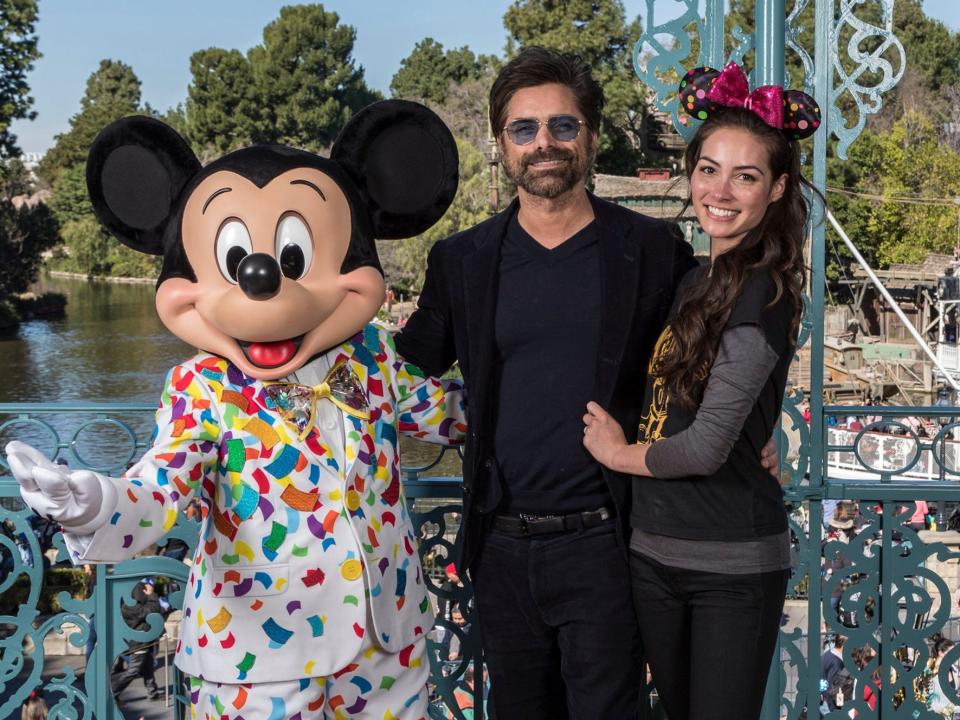 John Stamos and Caitlin McHugh Stamos at Disneyland.