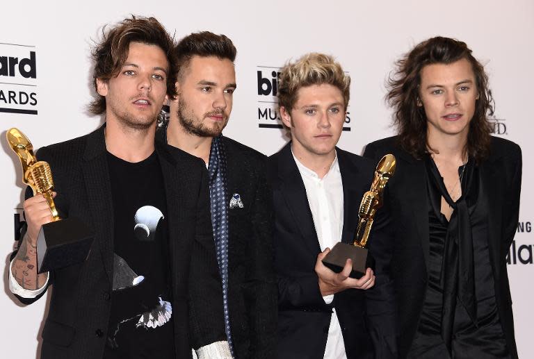 Singers Louis Tomlinson, Liam Payne, Niall Horan, and Harry Styles of One Direction in the press room at the 2015 Billboard Music Awards on May 17, 2015, at the MGM Grand Garden Arena