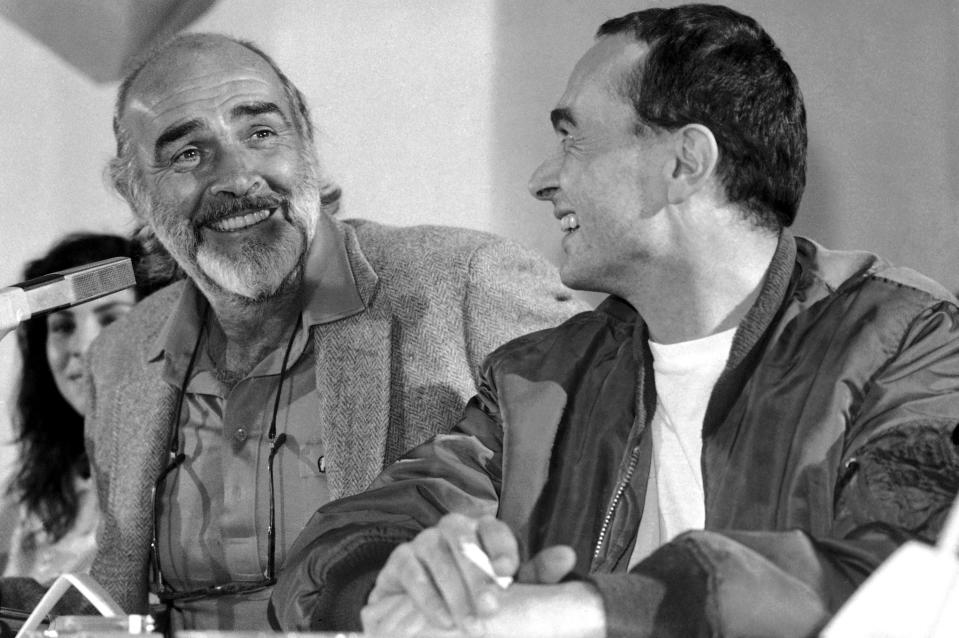 Connery and German producer Bernd Eichinger, right, smile together on November 8, 1985 at Kloster Eberbach near Ruedesheim, Germany where they intend to film "The Name of the Rose" with Connery in the title role of Franciscan friar William of Baskerville.