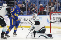 Buffalo Sabres right wing Tage Thompson (72) is stopped by Seattle Kraken goaltender Chris Driedger (60) during the first period of an NHL hockey game, Monday, Nov. 29, 2021, in Buffalo, N.Y. (AP Photo/Jeffrey T. Barnes)