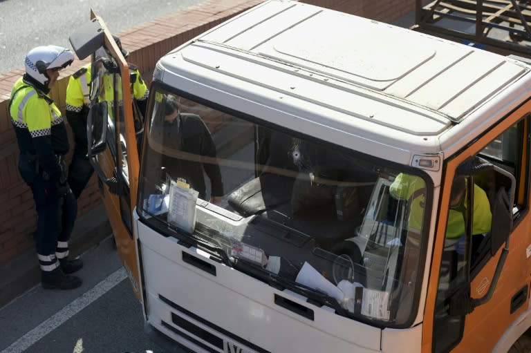 Spanish police inspect the butane gas delivery truck after forcing it to stop in Barcelona, on February 21, 2017