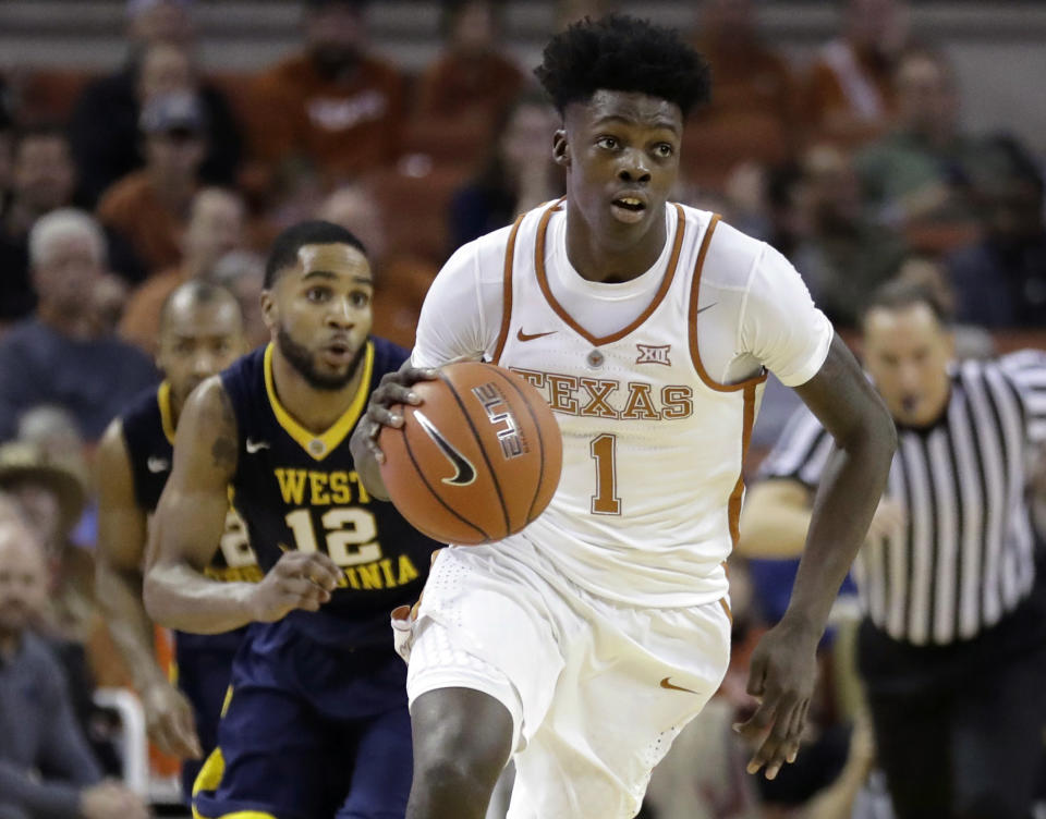 Texas guard Andrew Jones receives clearance to enroll in web-based coursework this summer. He remains recovering from leukemia.