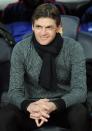 Tito Vilanova sonríe en el banquillo del estadio Camp Nou antes del partido entre FC Barcelona y Paris Saint-Germain jugado el 10 de abril de 2013 en la capital catalana (AFP/Archivos | Lluís Gené)