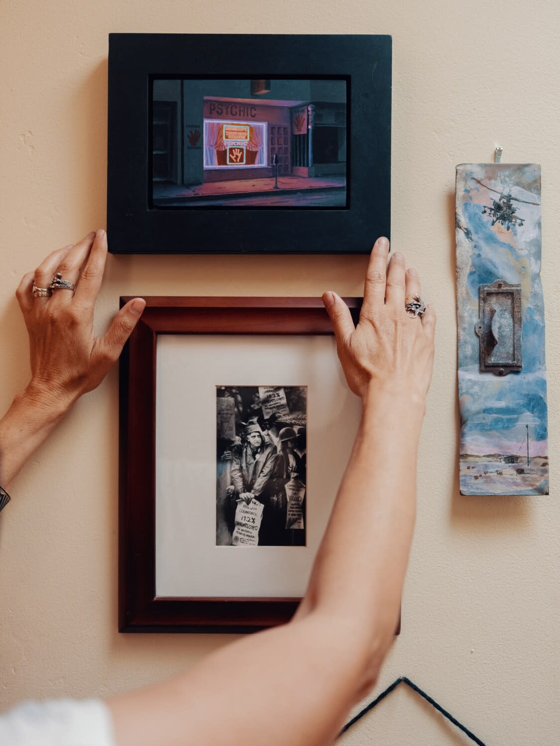 "Psychic" by James Doolin; Right: "Helicopter" by Anna Stump. Bottom: A photo that was the cover of Davis's first book