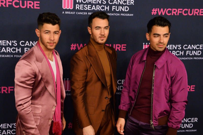 Nick Jonas, Kevin Jonas and Joe Jonas, from left to right, attend the An Unforgettable Evening benefit for the Women's Cancer Research Fund in 2020. File Photo by Jim Ruymen/UPI