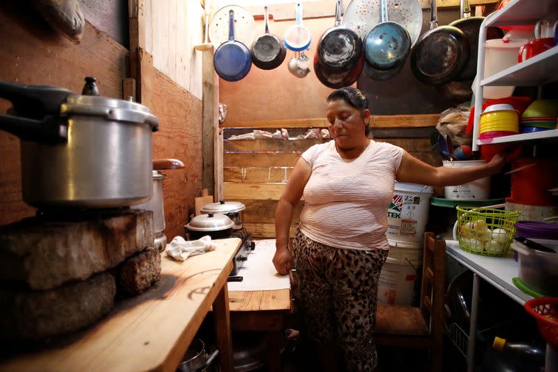 Rodriguez prepares breakfast in her house in the Tablas del Pozo neighborhood of Ecatepec amid the spread of the coronavirus disease (COVID-19) in the state of Mexico