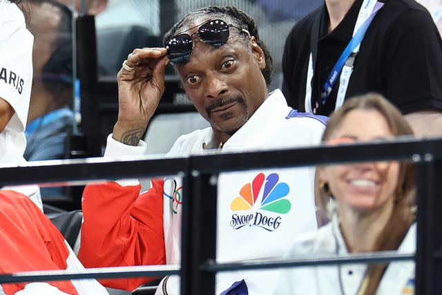 <p>Arturo Holmes/Getty</p> Snoop Dogg at the 2024 Summer Olympics in Paris