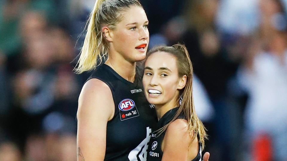 Tayla Harris and Georgia Gee of the Blues celebrate during a match against St Kilda.