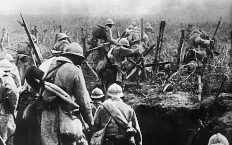 French soldiers moving into attack from their trench during the Verdun battle, eastern France, in 1916 - Credit: AFP