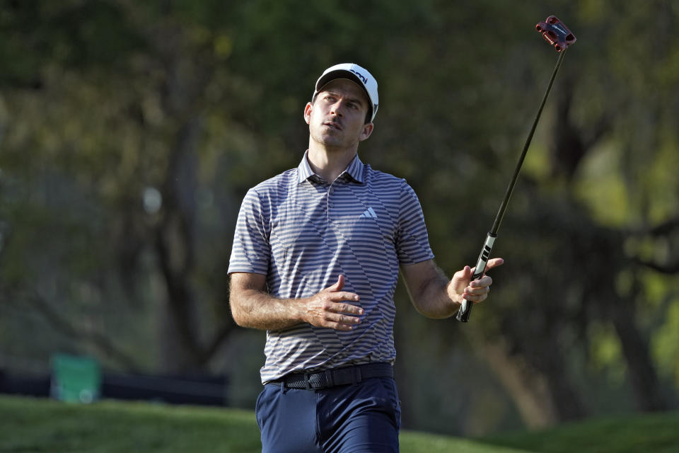 Nick Taylor, of Canada, reacts to making a bogey on the 14th hole during the second round of The Players Championship golf tournament Friday, March 15, 2024, in Ponte Vedra Beach, Fla. (AP Photo/Lynne Sladky)