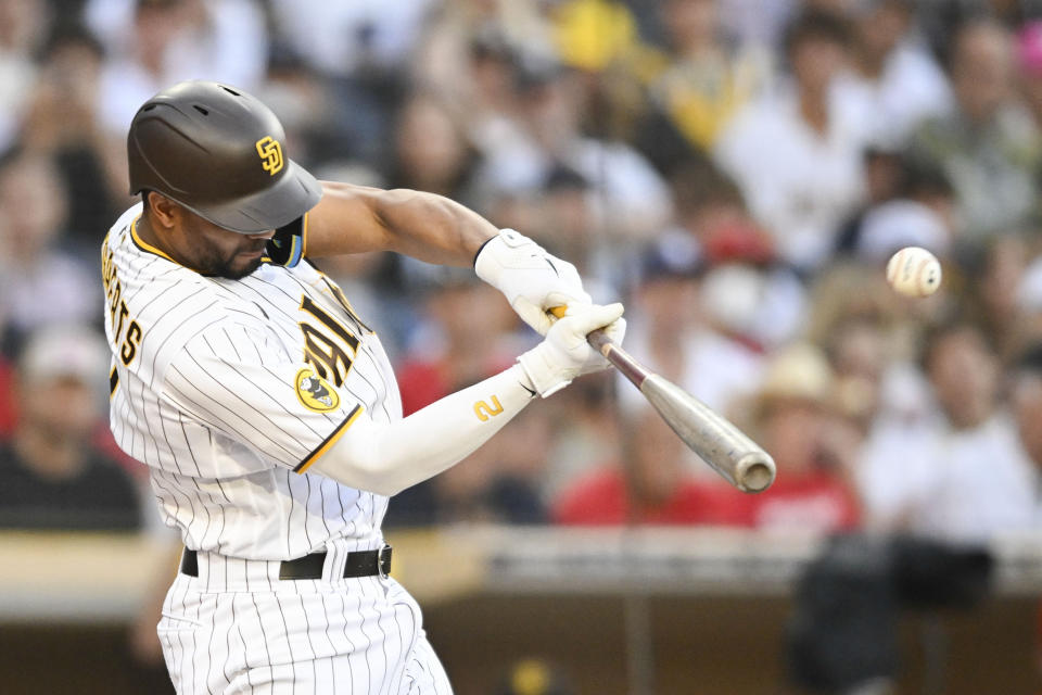 San Diego Padres' Xander Bogaerts hits a three-run home run during the first inning of a baseball game against the Los Angeles Angels, Monday, July 3, 2023, in San Diego. (AP Photo/Denis Poroy)