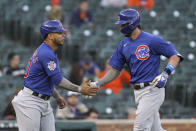 Chicago Cubs' Kris Bryant, right, celebrates his two-run home run with Willson Contreras against the Detroit Tigers in the third inning of a baseball game in Detroit, Friday, May 14, 2021. (AP Photo/Paul Sancya)