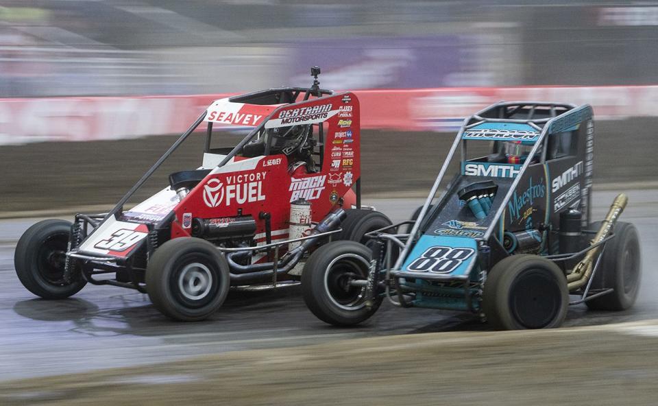 Logan Seavey, 39, and Tanner Thorson, 88, jockey for first place in the A Feature during the 2023 Lucas Oil Chili Bowl Nationals presented by General Tire at Tulsa Expo Raceway in Tulsa, Oklahoma on January 14, 2023. (Nick Oxford/NASCAR)