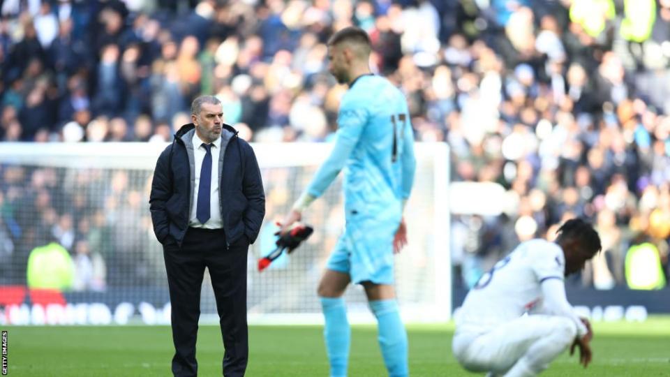 Tottenham manager Ange Postecoglou looks dejected after his side are beaten by Arsenal