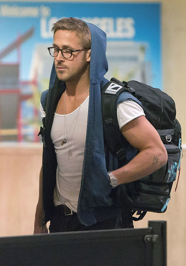 Ryan wearing a hoodie and backpack